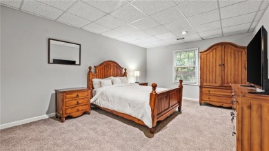 Located in the sought-after Pine Ridge Country Club Estates on Collins Hill Golf Club in Georgia - for sale on GolfHomes.com, golf home, golf lot