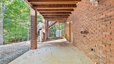 Located in the sought-after Pine Ridge Country Club Estates on Collins Hill Golf Club in Georgia - for sale on GolfHomes.com, golf home, golf lot