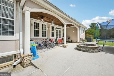 Welcome to this expansive executive-style estate, perfectly on Meadow Lakes Golf Course in Georgia - for sale on GolfHomes.com, golf home, golf lot
