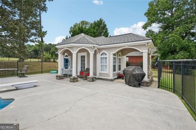 Welcome to this expansive executive-style estate, perfectly on Meadow Lakes Golf Course in Georgia - for sale on GolfHomes.com, golf home, golf lot