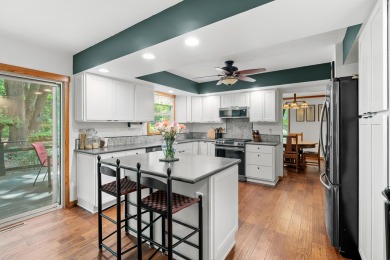 Tucked away on a large, private, wooded lot, this beautifully on Ridgeview Golf Course in Michigan - for sale on GolfHomes.com, golf home, golf lot