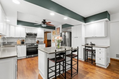 Tucked away on a large, private, wooded lot, this beautifully on Ridgeview Golf Course in Michigan - for sale on GolfHomes.com, golf home, golf lot