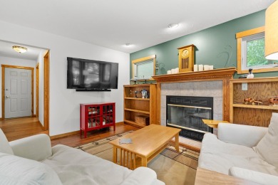 Tucked away on a large, private, wooded lot, this beautifully on Ridgeview Golf Course in Michigan - for sale on GolfHomes.com, golf home, golf lot