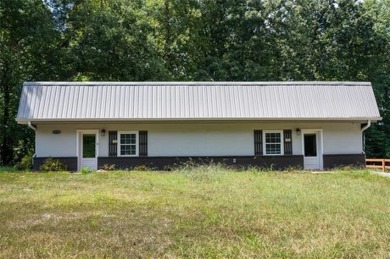 FULLY RENOVATED COMMERCIAL PROPERTY PERFECT FOR A MEDICAL on Sugar Hill Golf Club in Georgia - for sale on GolfHomes.com, golf home, golf lot