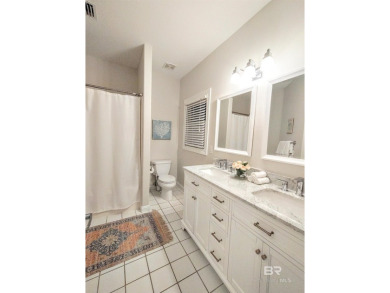 Nestled within a gated community, this stately GULF FRONT home on Kiva Dunes Golf Club in Alabama - for sale on GolfHomes.com, golf home, golf lot