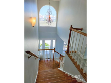 Nestled within a gated community, this stately GULF FRONT home on Kiva Dunes Golf Club in Alabama - for sale on GolfHomes.com, golf home, golf lot