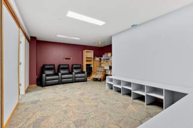 Tucked away on a large, private, wooded lot, this beautifully on Ridgeview Golf Course in Michigan - for sale on GolfHomes.com, golf home, golf lot