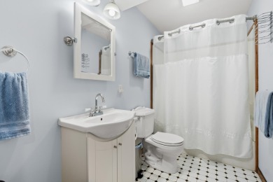 Tucked away on a large, private, wooded lot, this beautifully on Ridgeview Golf Course in Michigan - for sale on GolfHomes.com, golf home, golf lot