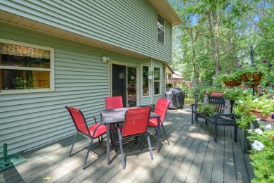 Tucked away on a large, private, wooded lot, this beautifully on Ridgeview Golf Course in Michigan - for sale on GolfHomes.com, golf home, golf lot