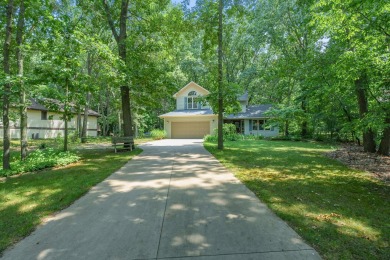 Tucked away on a large, private, wooded lot, this beautifully on Ridgeview Golf Course in Michigan - for sale on GolfHomes.com, golf home, golf lot