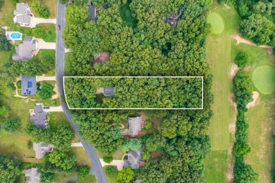 Tucked away on a large, private, wooded lot, this beautifully on Ridgeview Golf Course in Michigan - for sale on GolfHomes.com, golf home, golf lot