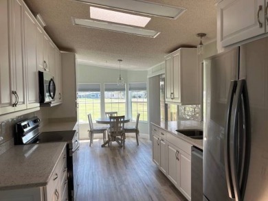 Come see this Stunning Home and Experience Golf Course Living on Four Lakes Golf Club in Florida - for sale on GolfHomes.com, golf home, golf lot