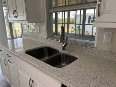 Come see this Stunning Home and Experience Golf Course Living on Four Lakes Golf Club in Florida - for sale on GolfHomes.com, golf home, golf lot