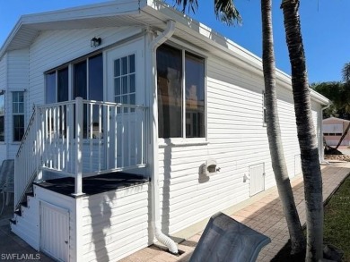 Open floor plan, high ceilings, a true 2Br/2Ba, and new roof in on The Rookery At Marco in Florida - for sale on GolfHomes.com, golf home, golf lot
