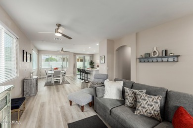 Beautifully reimagined, this 3-bedroom, 2-bath residence is on Arizona Traditions Golf Club in Arizona - for sale on GolfHomes.com, golf home, golf lot