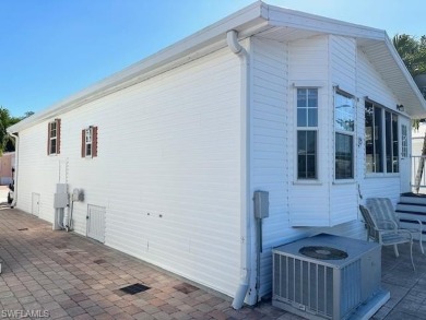 Open floor plan, high ceilings, a true 2Br/2Ba, and new roof in on The Rookery At Marco in Florida - for sale on GolfHomes.com, golf home, golf lot