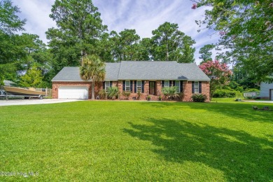 Exquisite move in ready brick home adjacent to Morehead City on Morehead City Country Club in North Carolina - for sale on GolfHomes.com, golf home, golf lot