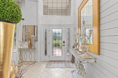 Situated within the gated community of Regatta Bay, this on Regatta Bay Golf and Country Club in Florida - for sale on GolfHomes.com, golf home, golf lot