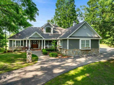 Discover architectural excellence in this stunning property on Boyne Highlands Golf Courses in Michigan - for sale on GolfHomes.com, golf home, golf lot