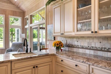 Discover architectural excellence in this stunning property on Boyne Highlands Golf Courses in Michigan - for sale on GolfHomes.com, golf home, golf lot