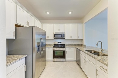 Step into luxury, lifestyle, and leisure within the sought-after on Lakewood National Golf Club in Florida - for sale on GolfHomes.com, golf home, golf lot