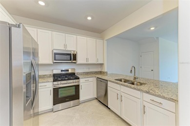 Step into luxury, lifestyle, and leisure within the sought-after on Lakewood National Golf Club in Florida - for sale on GolfHomes.com, golf home, golf lot