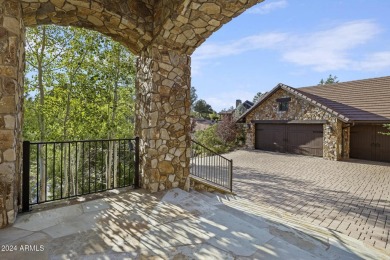 Nestled in the prestigious Rim Golf Club, this stunning custom on The Rim Golf Club in Arizona - for sale on GolfHomes.com, golf home, golf lot