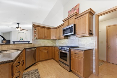 This beautifully designed 5-bedroom, 3-bath ranch with a 4-car on Auburn Hills Golf Course in Kansas - for sale on GolfHomes.com, golf home, golf lot