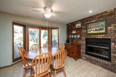 Set on a beautifully landscaped half-acre lot, this spacious on Urbandale Golf and Country Club in Iowa - for sale on GolfHomes.com, golf home, golf lot