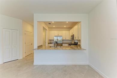 Step into luxury, lifestyle, and leisure within the sought-after on Lakewood National Golf Club in Florida - for sale on GolfHomes.com, golf home, golf lot