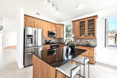 Premier Lakefront Living in The Enclave at Westchester - Brand on Westchester Golf and Country Club in Florida - for sale on GolfHomes.com, golf home, golf lot