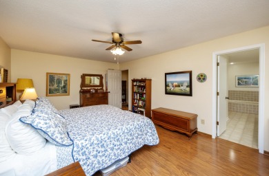 Set on a beautifully landscaped half-acre lot, this spacious on Urbandale Golf and Country Club in Iowa - for sale on GolfHomes.com, golf home, golf lot