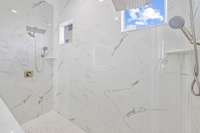 Brand-new modern estate in Palm City's prestigious Cobblestone on The Cape Club of Palm City in Florida - for sale on GolfHomes.com, golf home, golf lot