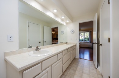 Set on a beautifully landscaped half-acre lot, this spacious on Urbandale Golf and Country Club in Iowa - for sale on GolfHomes.com, golf home, golf lot