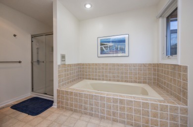 Set on a beautifully landscaped half-acre lot, this spacious on Urbandale Golf and Country Club in Iowa - for sale on GolfHomes.com, golf home, golf lot