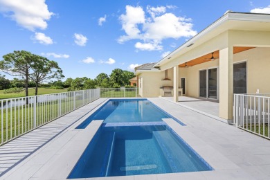 Brand-new modern estate in Palm City's prestigious Cobblestone on The Cape Club of Palm City in Florida - for sale on GolfHomes.com, golf home, golf lot