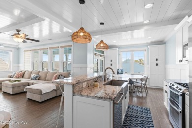 This home is made for living both inside and out! The finest in on Founders Club At St. James Plantation in North Carolina - for sale on GolfHomes.com, golf home, golf lot