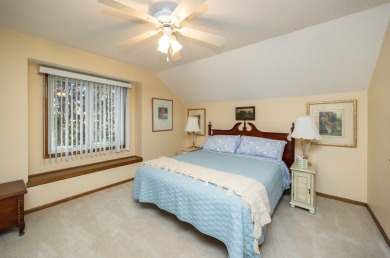 Set on a beautifully landscaped half-acre lot, this spacious on Urbandale Golf and Country Club in Iowa - for sale on GolfHomes.com, golf home, golf lot