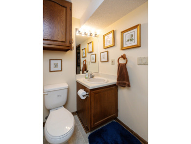 Set on a beautifully landscaped half-acre lot, this spacious on Urbandale Golf and Country Club in Iowa - for sale on GolfHomes.com, golf home, golf lot