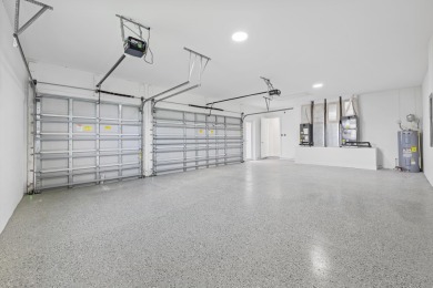 Brand-new modern estate in Palm City's prestigious Cobblestone on The Cape Club of Palm City in Florida - for sale on GolfHomes.com, golf home, golf lot