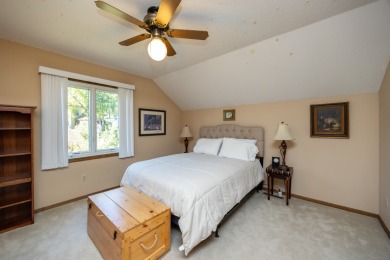 Set on a beautifully landscaped half-acre lot, this spacious on Urbandale Golf and Country Club in Iowa - for sale on GolfHomes.com, golf home, golf lot