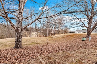 Welcome home to this 3BR/2.5BA Heather Hills residence. This on Heather Hills Golf Course in North Carolina - for sale on GolfHomes.com, golf home, golf lot