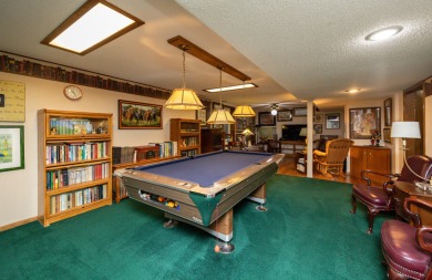 Set on a beautifully landscaped half-acre lot, this spacious on Urbandale Golf and Country Club in Iowa - for sale on GolfHomes.com, golf home, golf lot