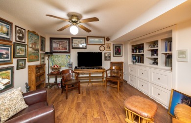 Set on a beautifully landscaped half-acre lot, this spacious on Urbandale Golf and Country Club in Iowa - for sale on GolfHomes.com, golf home, golf lot