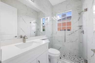 Brand-new modern estate in Palm City's prestigious Cobblestone on The Cape Club of Palm City in Florida - for sale on GolfHomes.com, golf home, golf lot