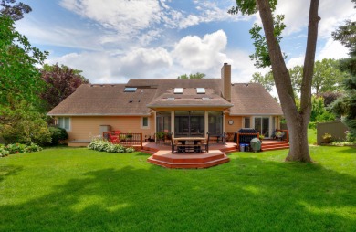 Set on a beautifully landscaped half-acre lot, this spacious on Urbandale Golf and Country Club in Iowa - for sale on GolfHomes.com, golf home, golf lot