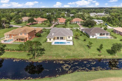 Brand-new modern estate in Palm City's prestigious Cobblestone on The Cape Club of Palm City in Florida - for sale on GolfHomes.com, golf home, golf lot