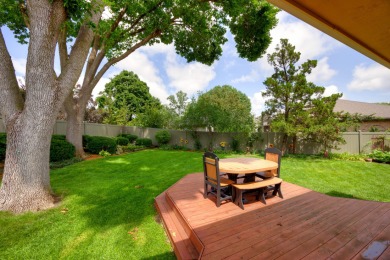 Set on a beautifully landscaped half-acre lot, this spacious on Urbandale Golf and Country Club in Iowa - for sale on GolfHomes.com, golf home, golf lot