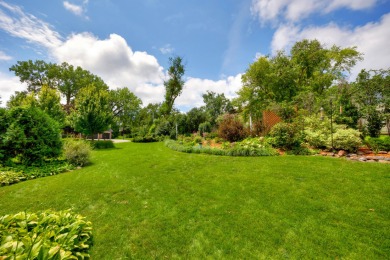 Set on a beautifully landscaped half-acre lot, this spacious on Urbandale Golf and Country Club in Iowa - for sale on GolfHomes.com, golf home, golf lot