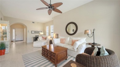 BRIGHT and CHEERFUL, three bedroom, two bathroom, FIRST FLOOR on Capri Isle Golf Club in Florida - for sale on GolfHomes.com, golf home, golf lot